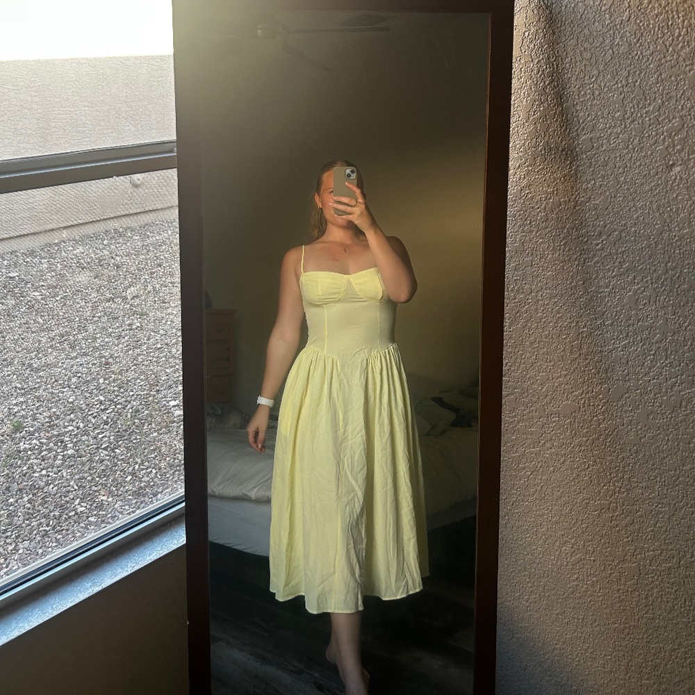 Women’s tea length yellow dress